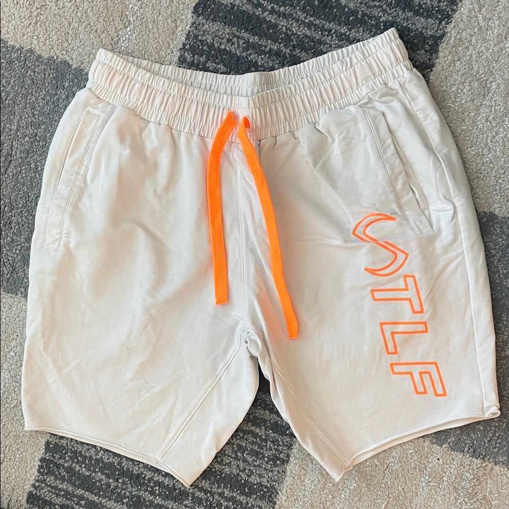 STLF Men's Cream Athletic Shorts with Orange Accents